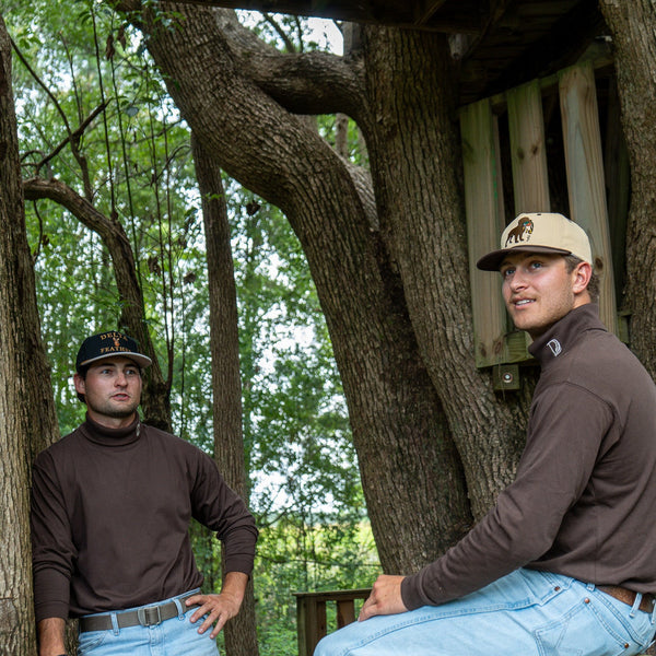 Two men wearing the Coffee Bean Rendezvous Turtleneck outdoors