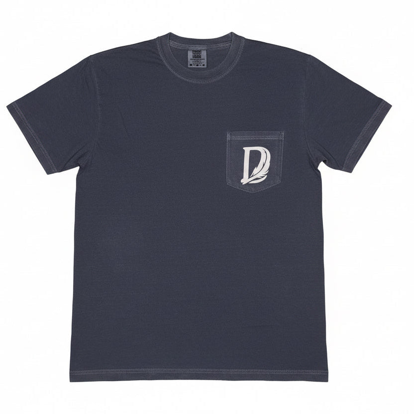 Navy blue t-shirt with a logo on a wooden surface