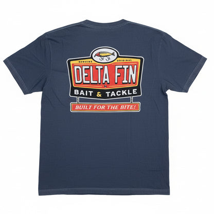 Navy blue t-shirt with a Delta Fin Bait & Tackle logo on a wooden floor.