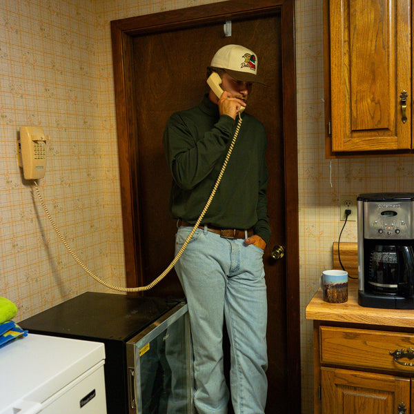 Man wearing the Forest Green Rendezvous Turtleneck