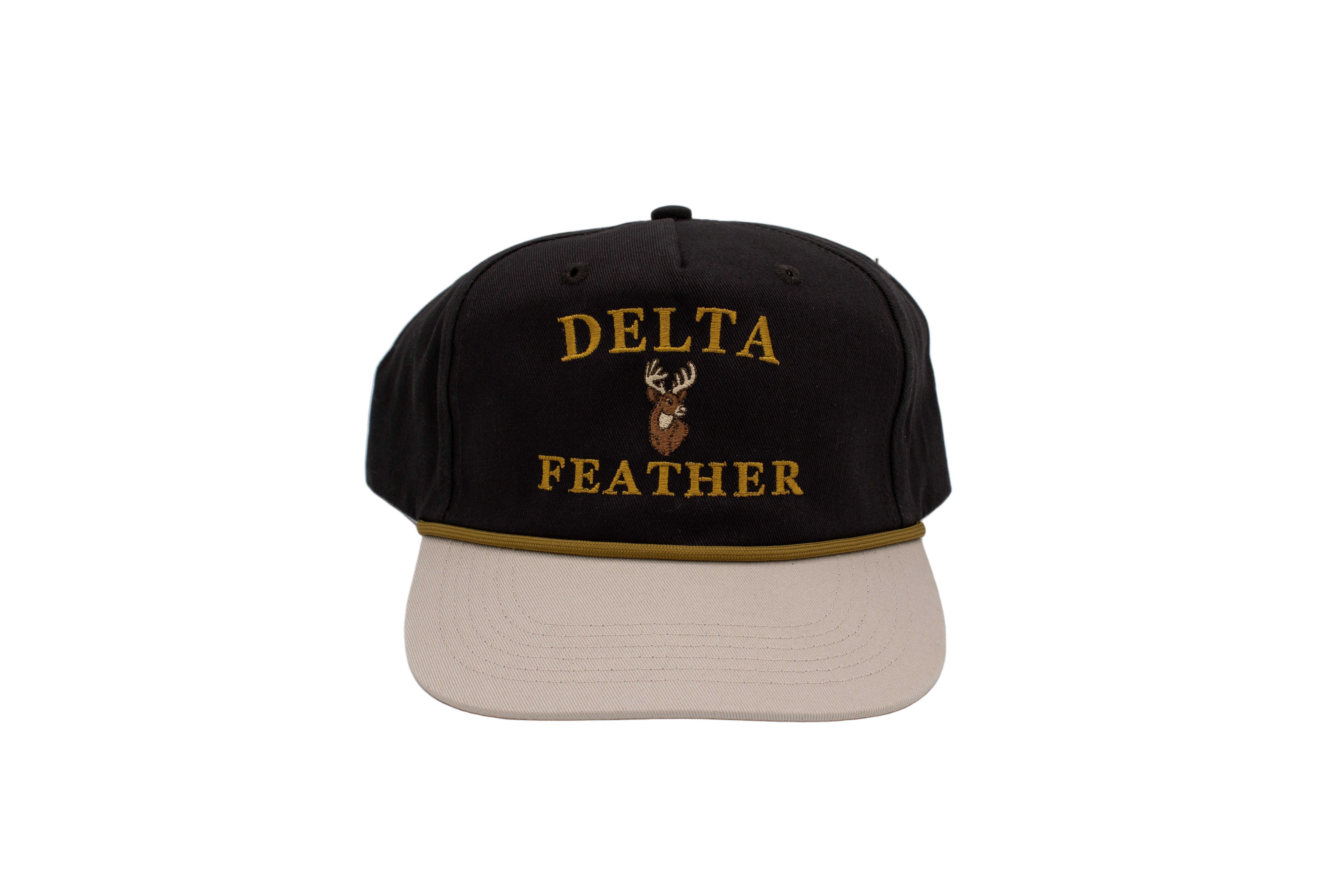 The words Delta Feather with a deer in the middle. On a black hat with a tan bill. 