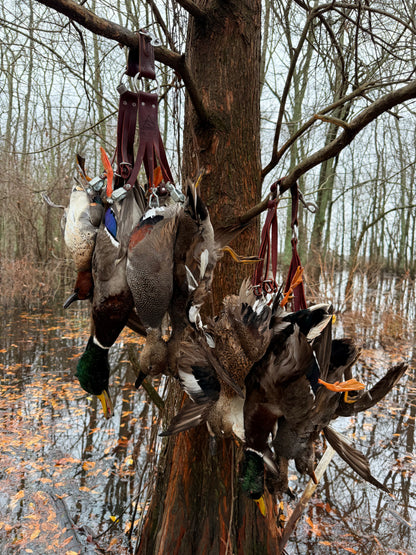 Delta Feather Leg Lok handmade leather duck strap for waterfowl hunters — close-up