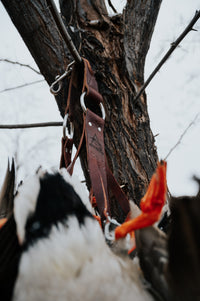 Delta Feather Leg Lok handmade leather duck strap for waterfowl hunters — lifestyle shot