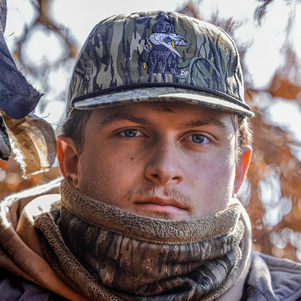 Delta Feather Man's Best Friend Treestand camo hat with dog and mallard logo — alternate view