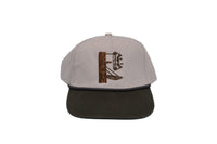 Delta Feather The Lock On deer hunting hat with DF carved into tree bark