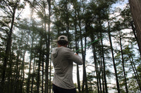 Delta Feather The Toad bass sun hoodie with UV protection for anglers — lifestyle shot