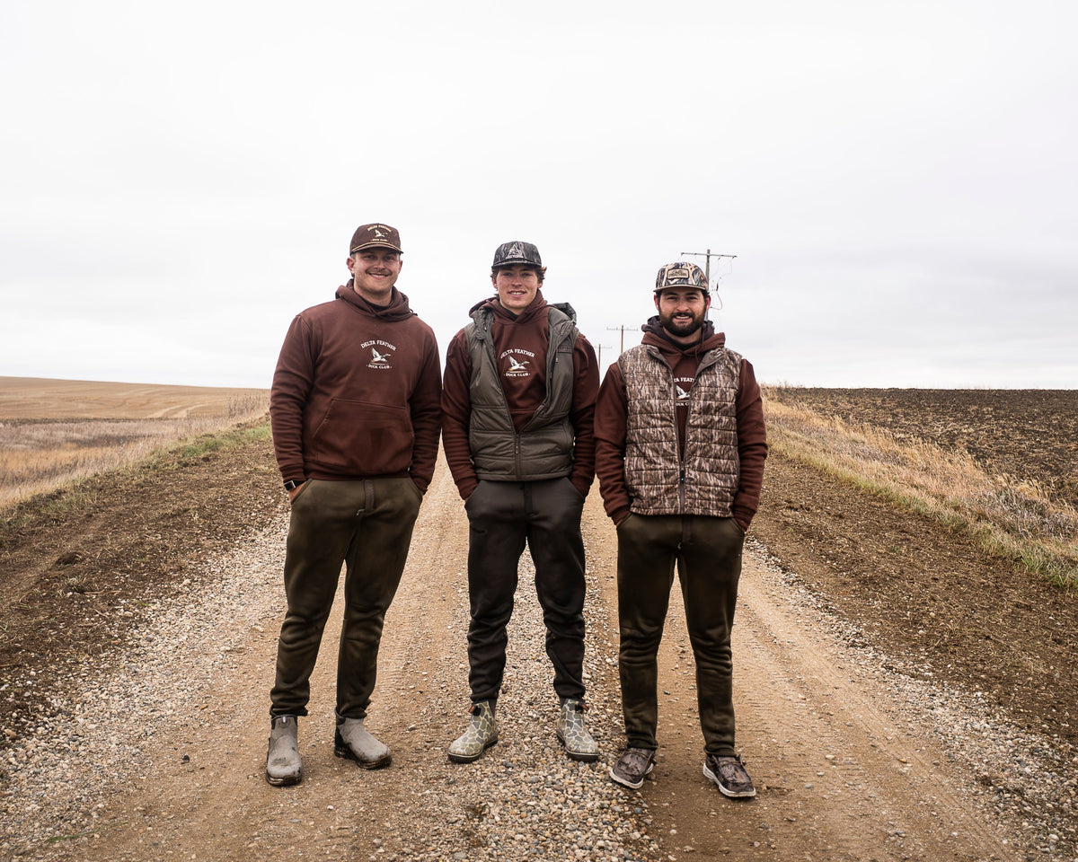 Three hunters in Delta Feather Duck Club Heavyweight Hoodies