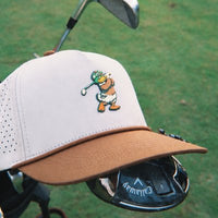 Close up of the Duck Hook hat showing the mallard golfer PVC patch and laser perforated venting